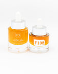 Two bottles of Formula Flawless skincare product on a white background