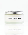 Jar of F176 Amber Lux on a white background