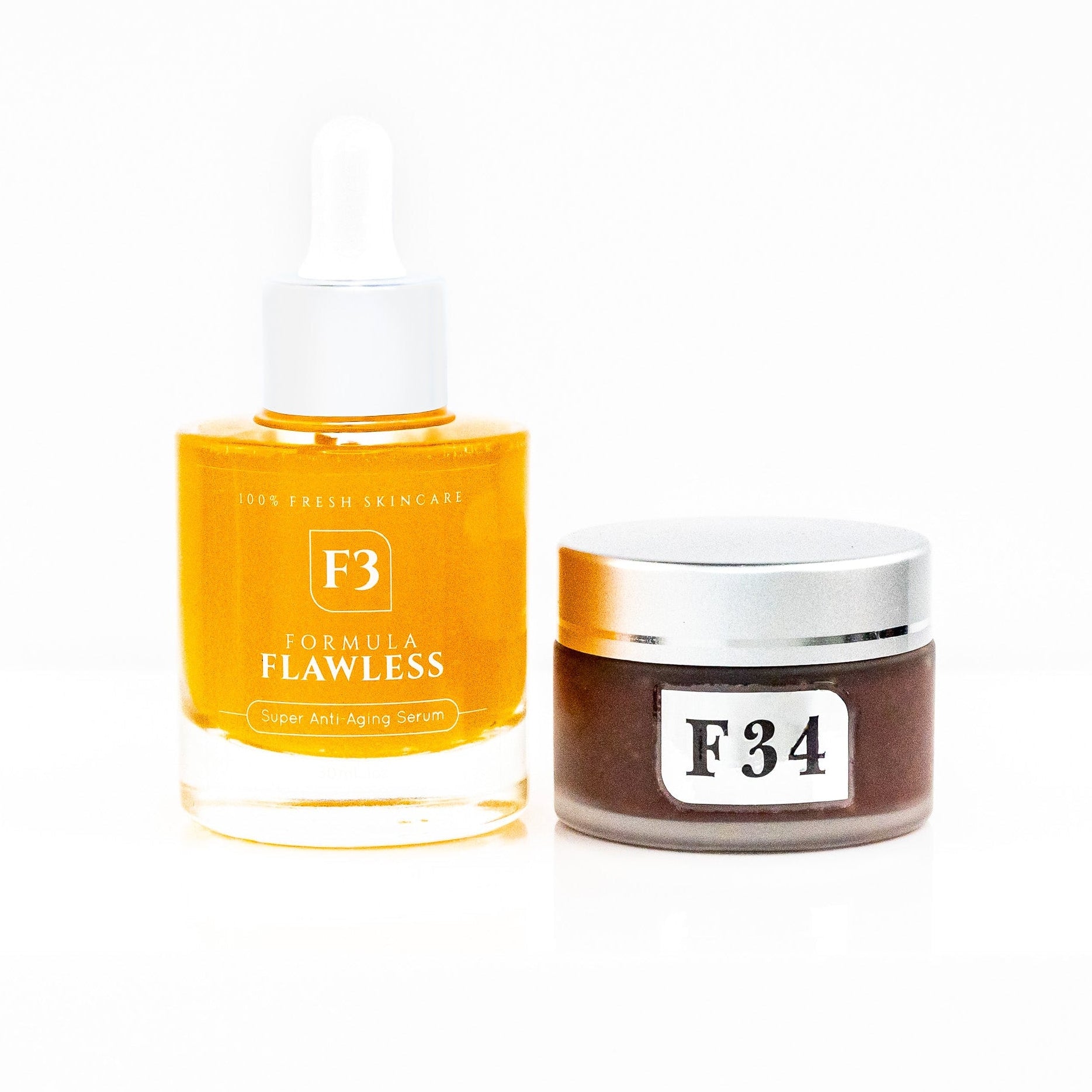 Two skincare products with &#39;Formula Flawless&#39; branding on a white background