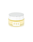 Jar of cream with 'F22' label on a white background